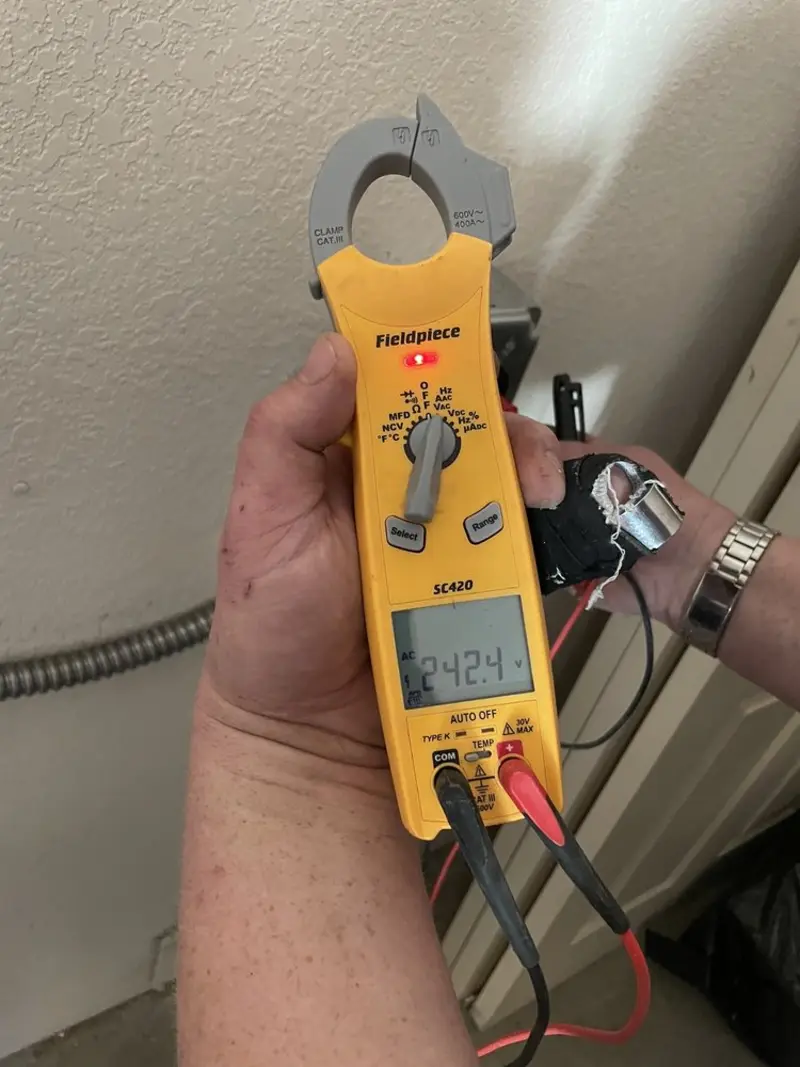 Voltage testing with clamp meter during Circuit Breaker Repair in Morristown